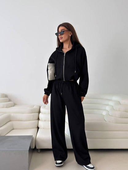 Fashionable women's hoodie with a short cut and matching jogger pants Chic and Style