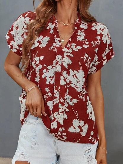 Blouse décontractée pour femmes avec motif floral et courte patte de boutonnage Chic und Stil