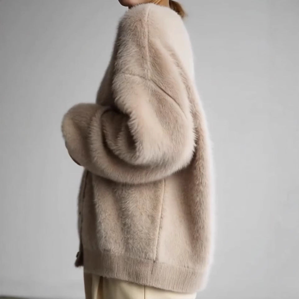 Cardigan en peluche pour dames avec boutons élégants et coupe ample Chic und Stil