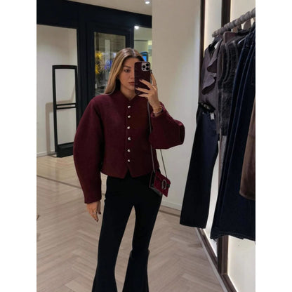 Dames cardigan à la mode avec des boutons frappants Chic und Stil