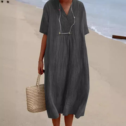 Robe de plage décontractée pour femmes avec décolleté en V et ourlet large Chic und Stil