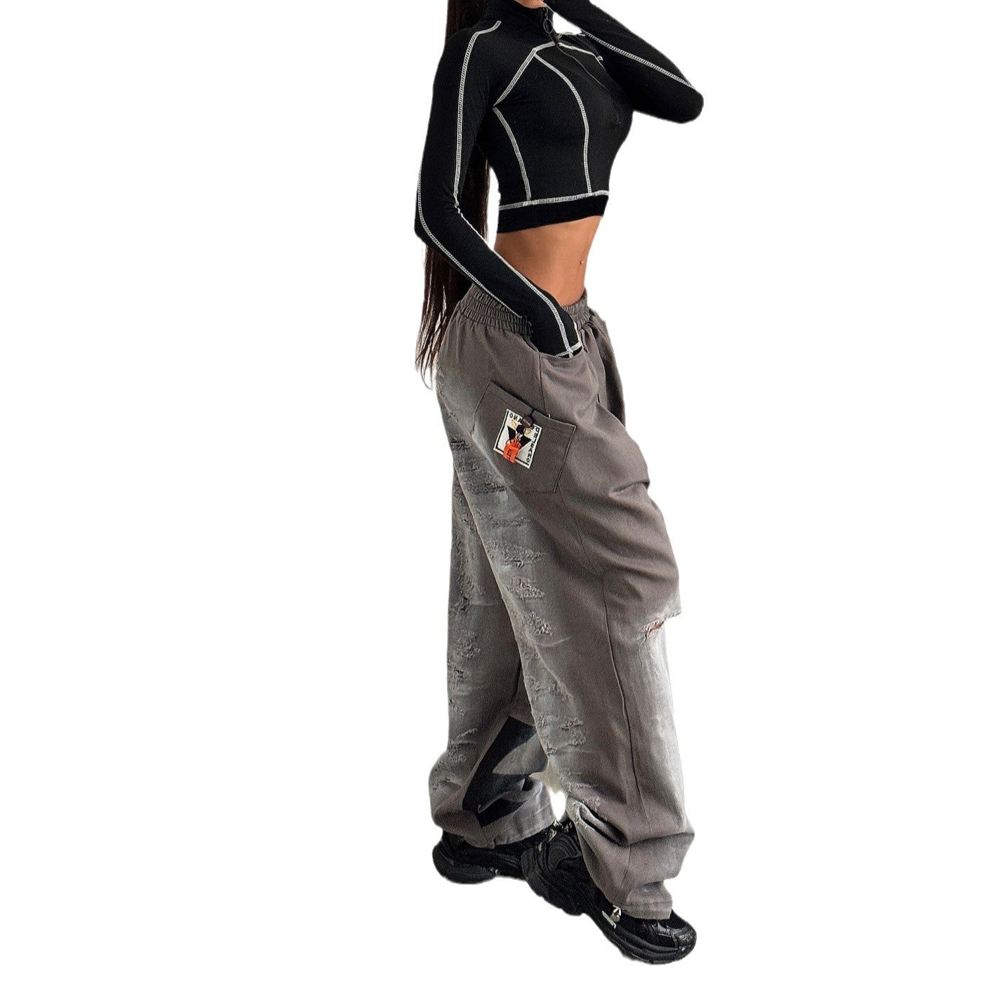 Casual women's pants with an oversized relaxed fit and trendy tear details Chic and Style