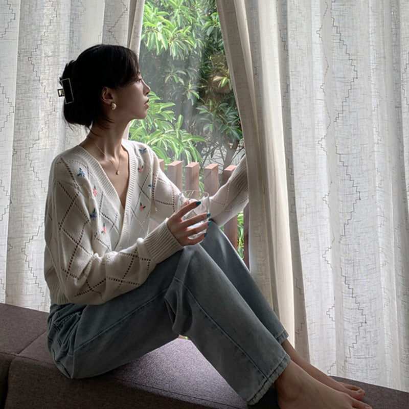 Dames cardigan ludique avec motif floral en losanges et détail boutons Chic und Stil