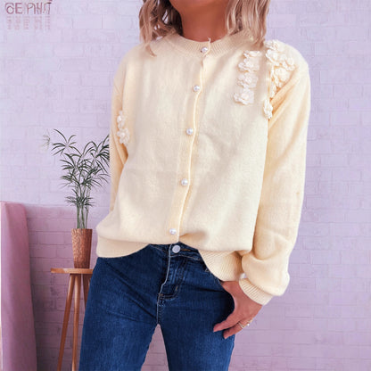 Dames cardigan avec design floral et boutons en perles élégants Chic und Stil