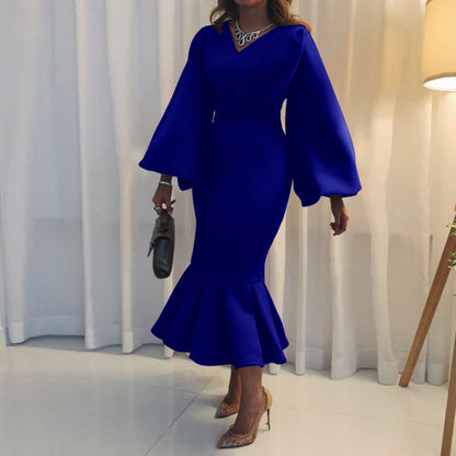 Robe ajustée pour femmes avec des manches volumineuses et un ourlet flottant Chic und Stil