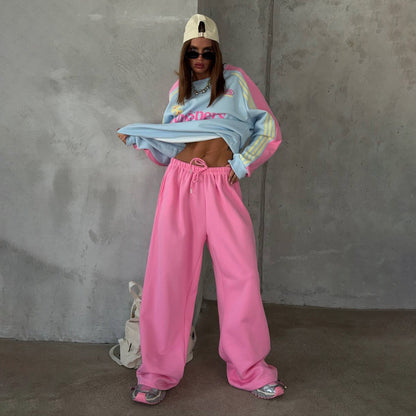 Ladies Casual Sports Outfit with a Relaxed Sweatshirt and Comfortable Jogging Pants Chic and Style