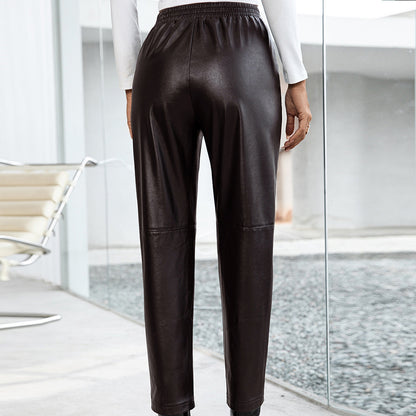 Fashionable synthetic leather pants for women with elastic waistband and side pockets Chic and Style