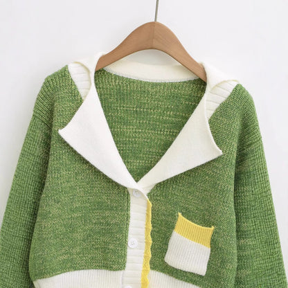 Ladies comfortable knit pullover with an elegant shawl collar and contrasting pockets Chic and Style