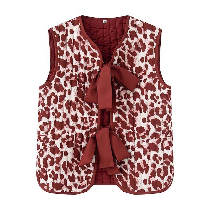 Dames gilet matelassé avec motif animal à la mode et nœud décoratif Chic und Stil