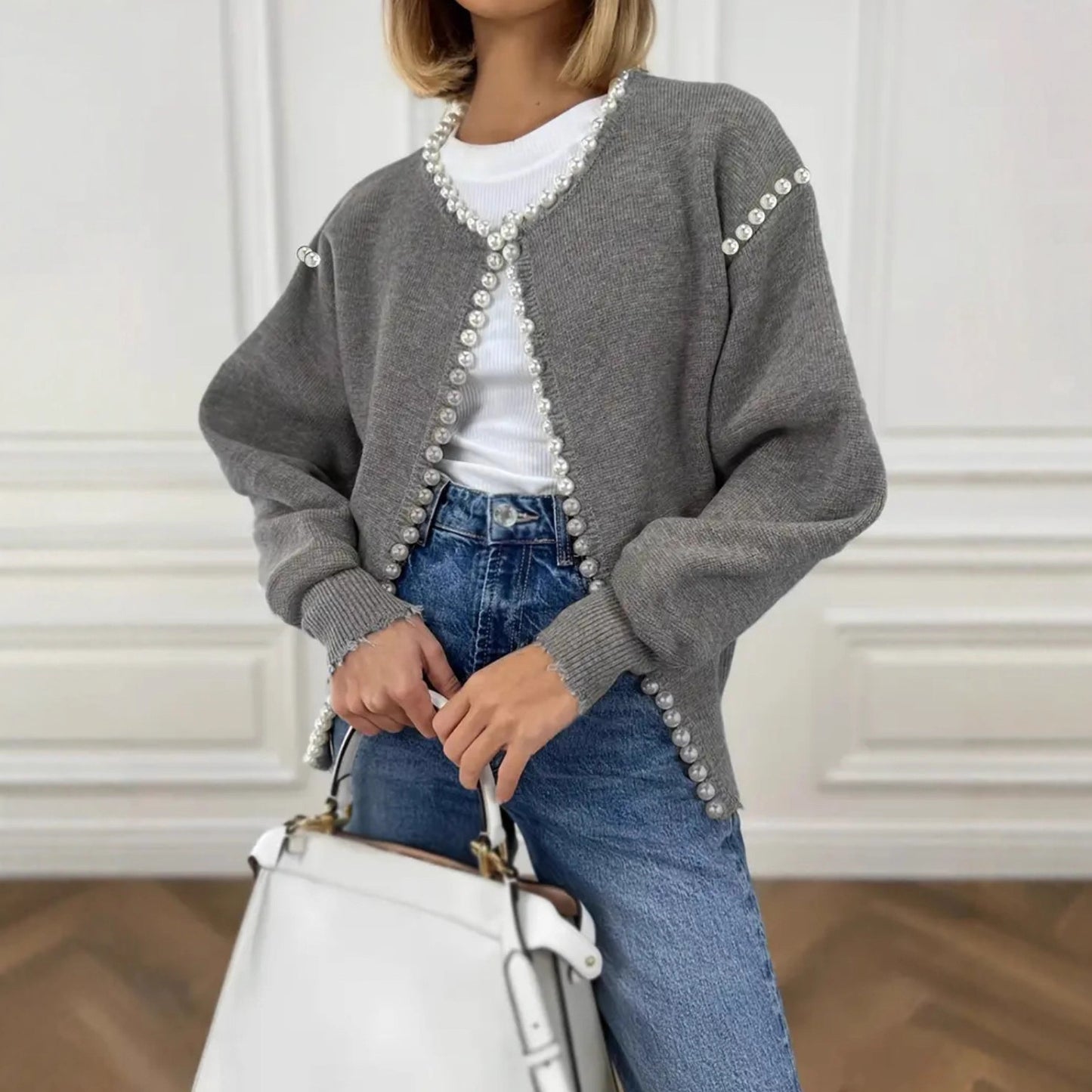 Veste en tricot pour femmes avec des embellissements en perles frappants et un design ouvert Chic und Stil