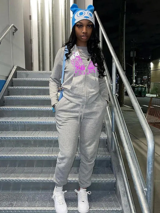 Ladies hoodie jacket and jogger pants with a unique spider web design Chic and Style