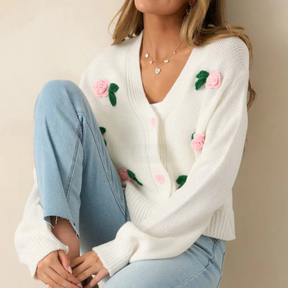 Veste en tricot pour femmes avec des appliqués floraux et des détails de bouton confortables Chic und Stil