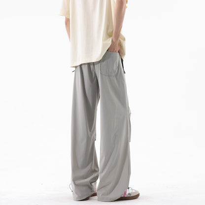 Loose sports pants for men with a remarkable draped design Chic and Style