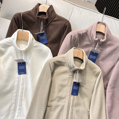 Veste en polaire pour femmes avec col haut et poches zippées sur les côtés Chic & Stil