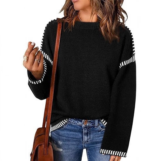 Pull féminin à la mode avec un matériau structuré et des détails en forme de rayures Chic und Stil