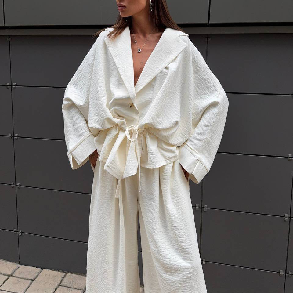 Combinaison de jumpsuit à la mode pour femmes avec coupe large et ceinture cintrée Chic und Stil