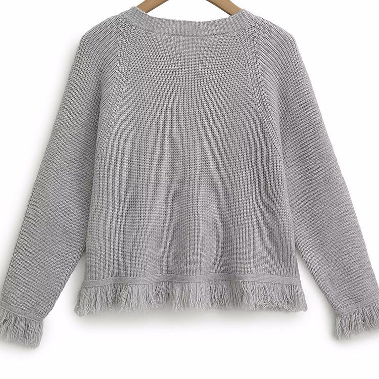 Dames cardigan avec des bords frangés et des détails de bouton Chic und Stil