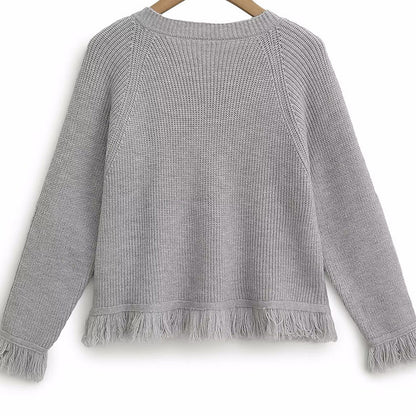 Dames cardigan avec des bords frangés et des détails de bouton Chic und Stil