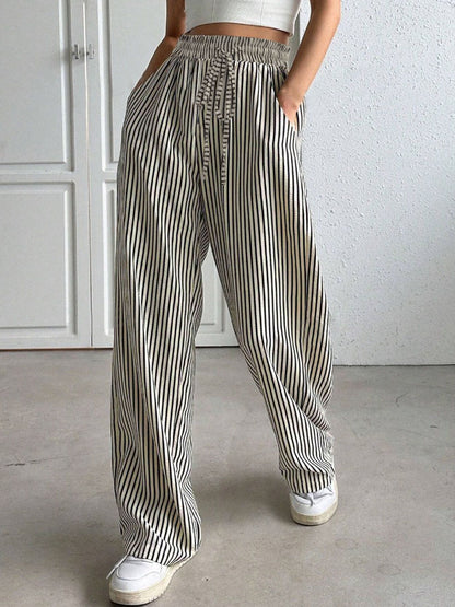 Wide striped pants for women with elastic waist and practical pockets Chic and Style