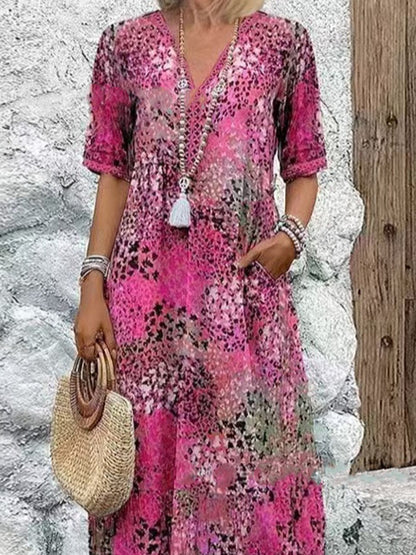 Robe maxi femme avec décolleté en V et poches latérales pratiques Chic und Stil