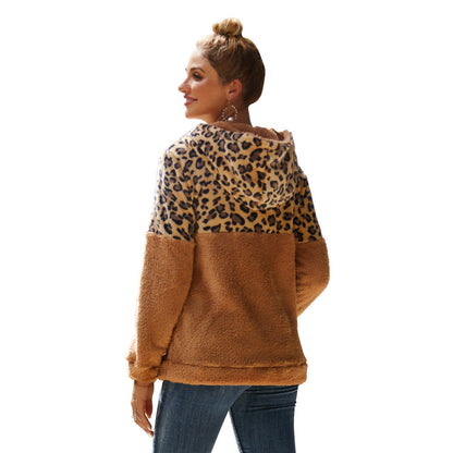 Pull à capuche confortable pour femmes avec un motif léopard excitant et poche kangourou Chic und Stil