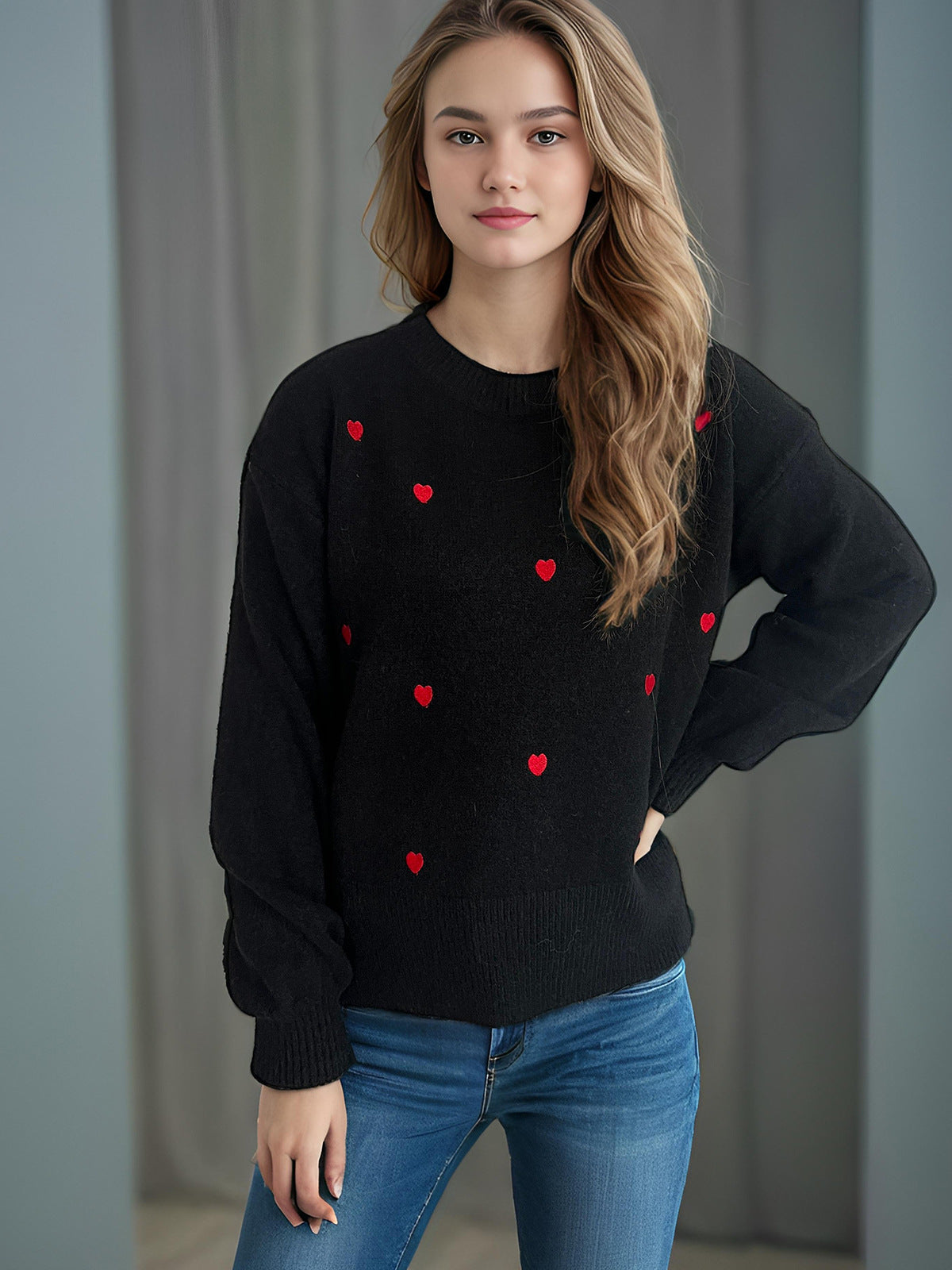 Pull femme avec un design de cœur ludique Chic und Stil