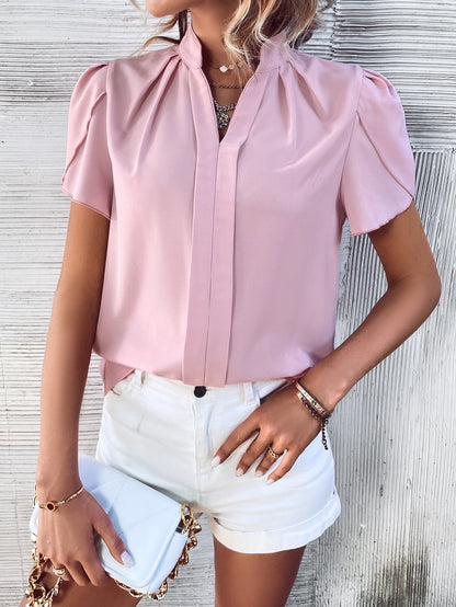 Chemisier pour femmes avec manches bouffantes et élégant boutonnière Chic und Stil