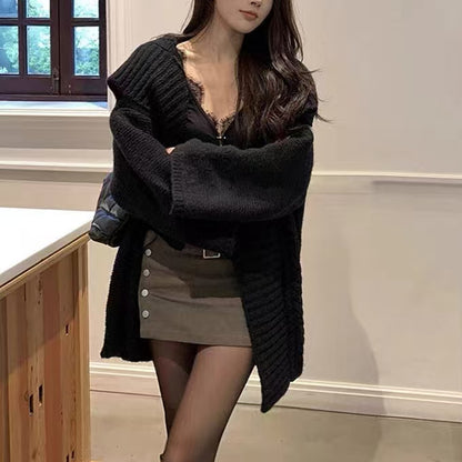 Dame cardigan oversize avec des manches volumineuses et une surface texturée Chic und Stil