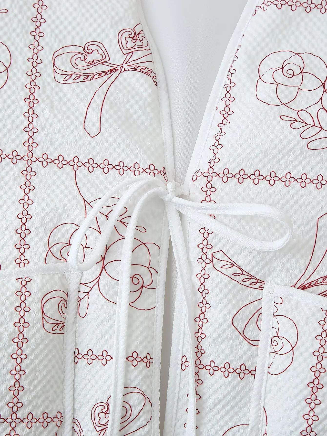 Dame veste avec motif floral et poches pratiques Chic und Stil