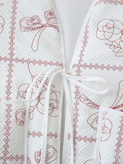 Dame veste avec motif floral et poches pratiques Chic und Stil