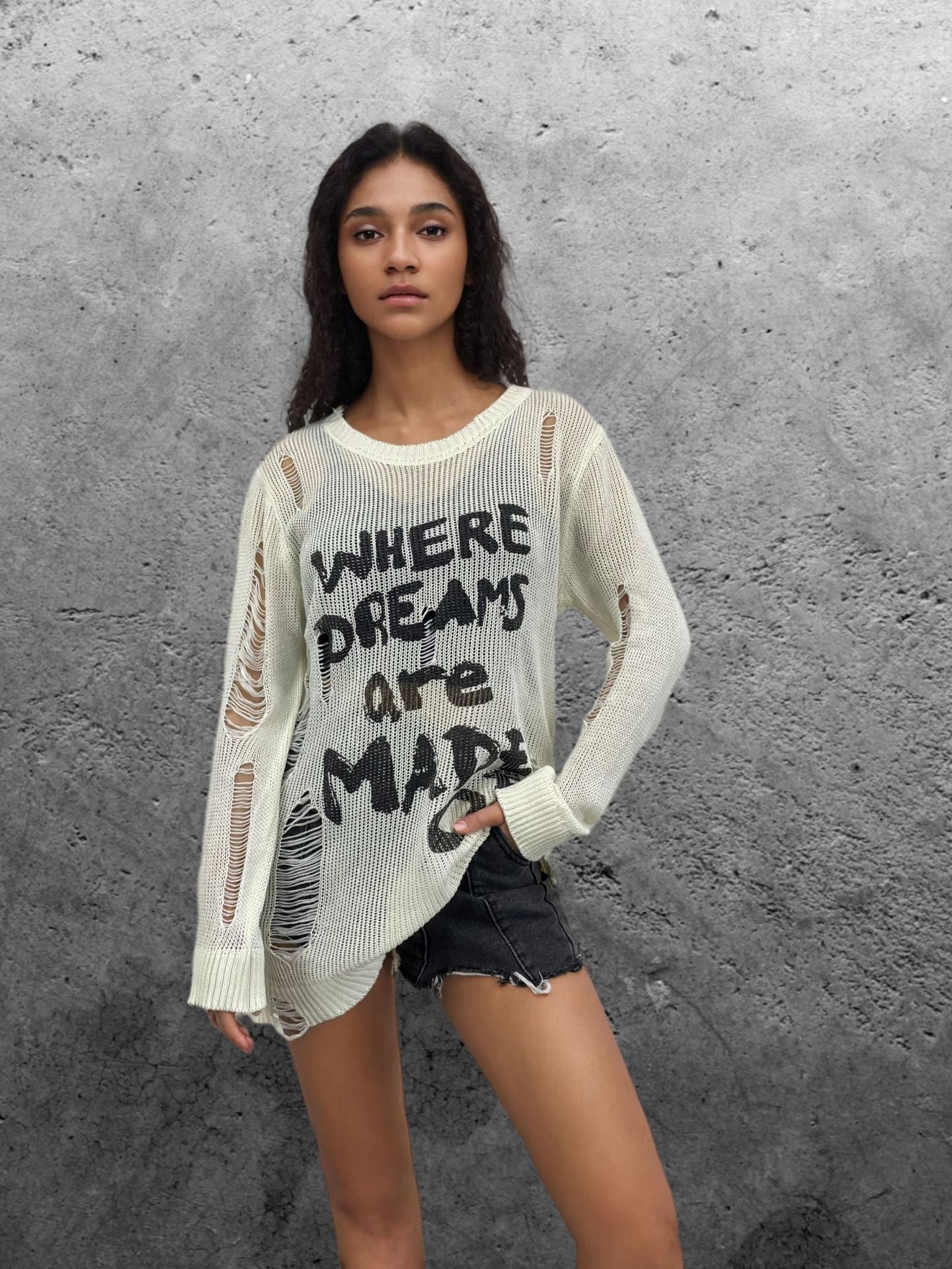 Dames pull oversize décontracté avec inscription accrocheuse et détails en tricot Chic und Stil
