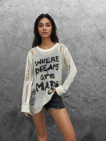 Dames pull oversize décontracté avec inscription accrocheuse et détails en tricot Chic und Stil