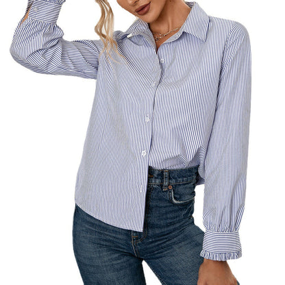 Chemisier femme à motif rayé et détail de bouton tendance Chic und Stil
