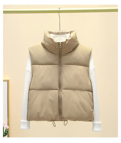 Dames gilet matelassé avec col haut et taille ajustable Chic und Stil