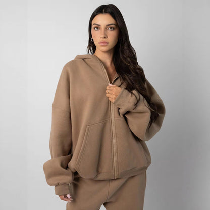Femmes pull à capuche oversized à la mode avec pantalon de jogging assorti Chic und Stil