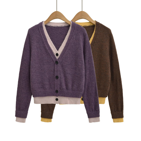 Pull élégant pour femmes avec décolleté en V profond et boutons décoratifs Chic und Stil