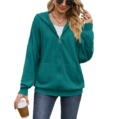 Dames Pull à capuche surdimensionné avec motif texturé et poches pratiques Chic und Stil