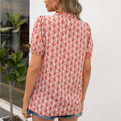 Blouse pour dames avec des détails en volants et un motif floral Chic und Stil