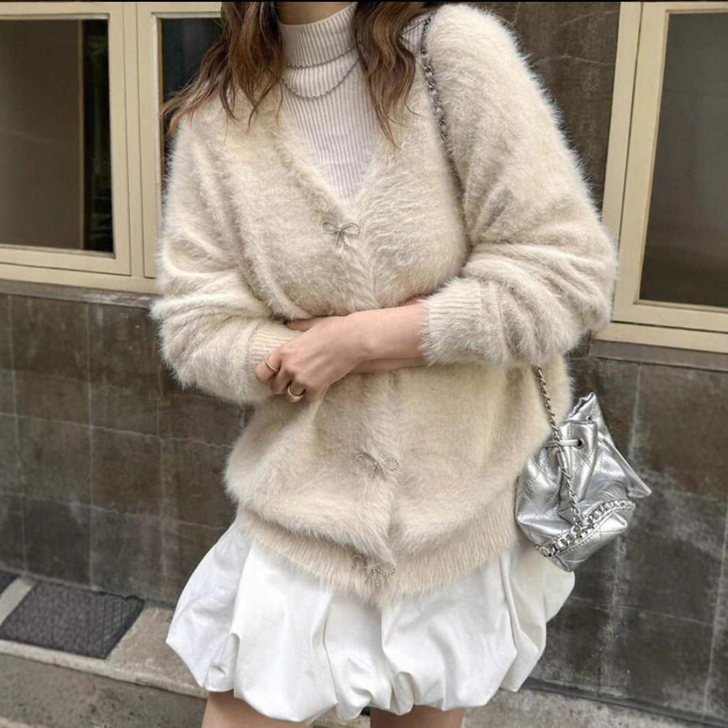 Dames Pull en maille pelucheux avec des détails de boutons élégants Chic und Stil