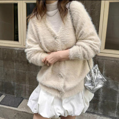 Dames Pull en maille pelucheux avec des détails de boutons élégants Chic und Stil