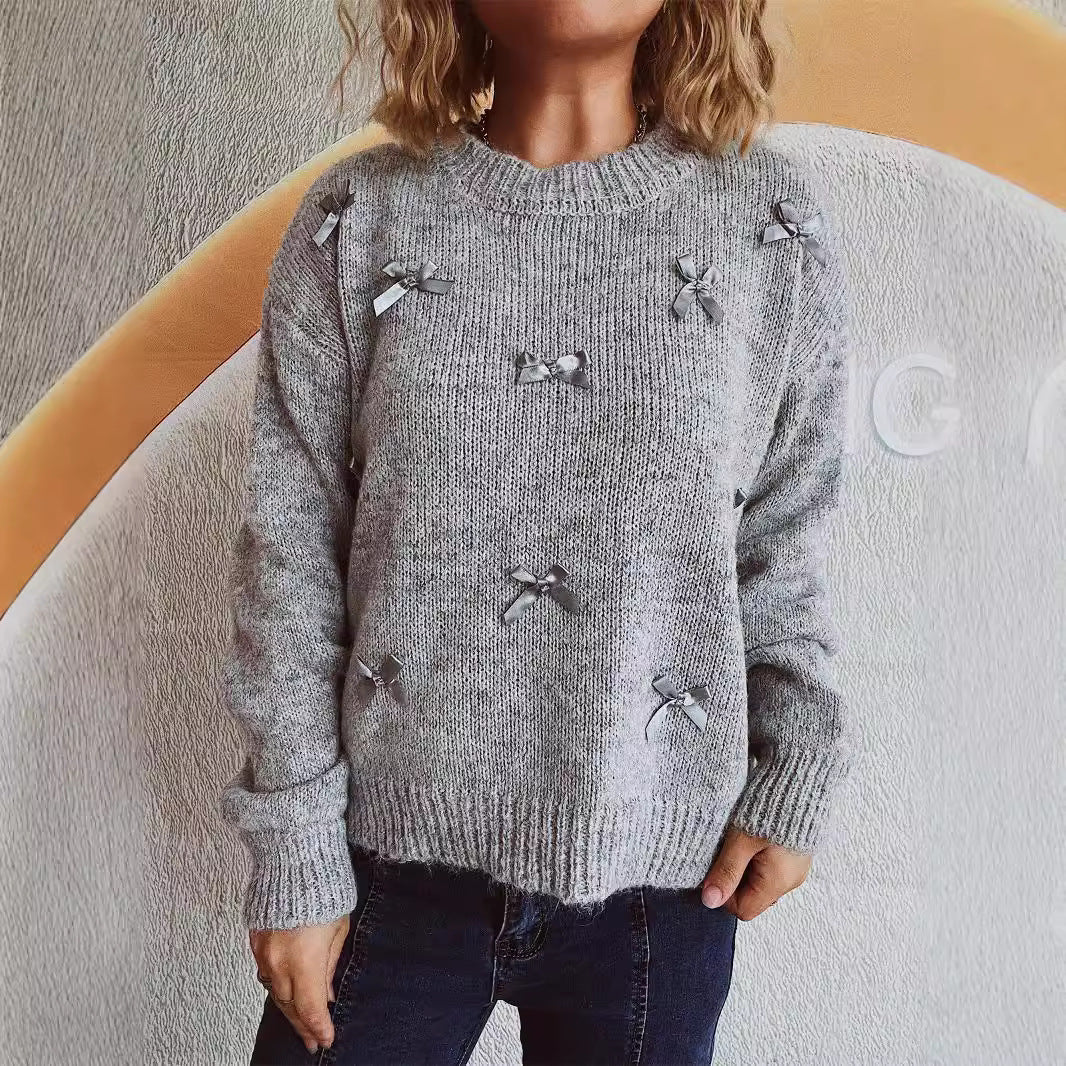 Pull en tricot pour femmes avec des accents de nœuds ludiques Chic und Stil