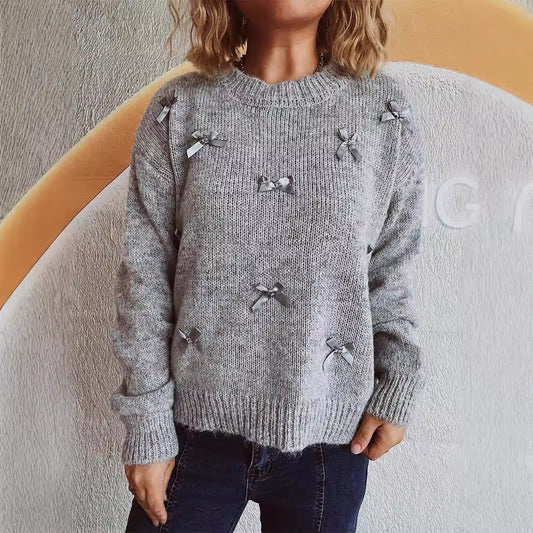 Pull en tricot pour femmes avec des accents de nœuds ludiques Chic und Stil