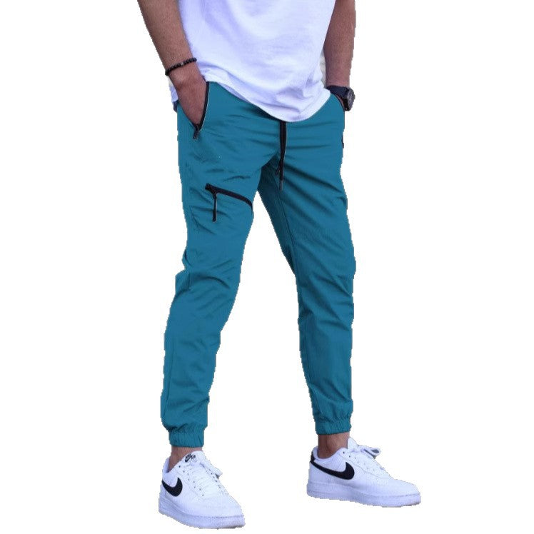 Light sporty pants for men with side zip pockets Chic and Style