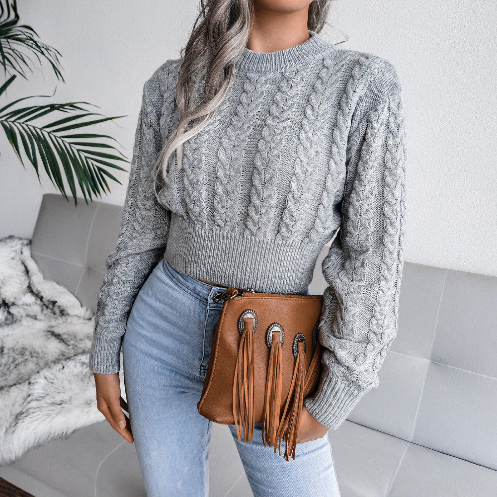 Pull en maille épaisse pour femmes avec ourlet allongé et appliques en cuir synthétique Chic und Stil