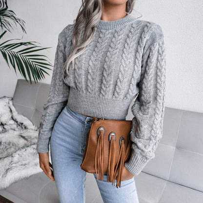 Pull en maille épaisse pour femmes avec ourlet allongé et appliques en cuir synthétique Chic und Stil