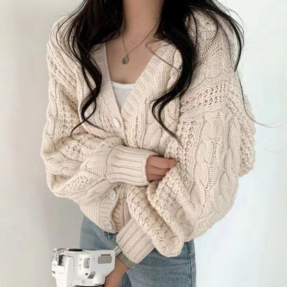 Dames gros tricot cardigan avec des manches volumineuses et une surface texturée Chic und Stil