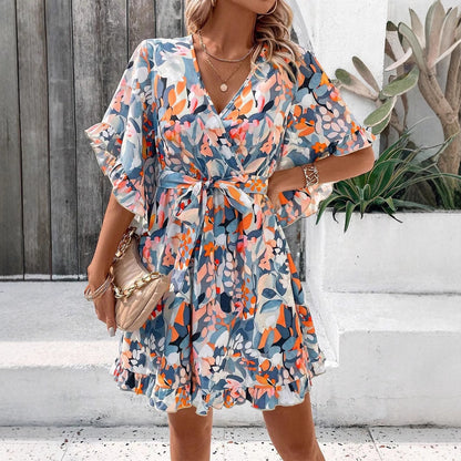 Robe portefeuille pour femmes avec motifs floraux et manches aérées Chic und Stil