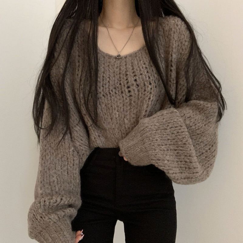 Pull en tricot décontracté pour femmes avec des manches bouffantes volumineuses et une structure en tricot ouverte Chic und Stil