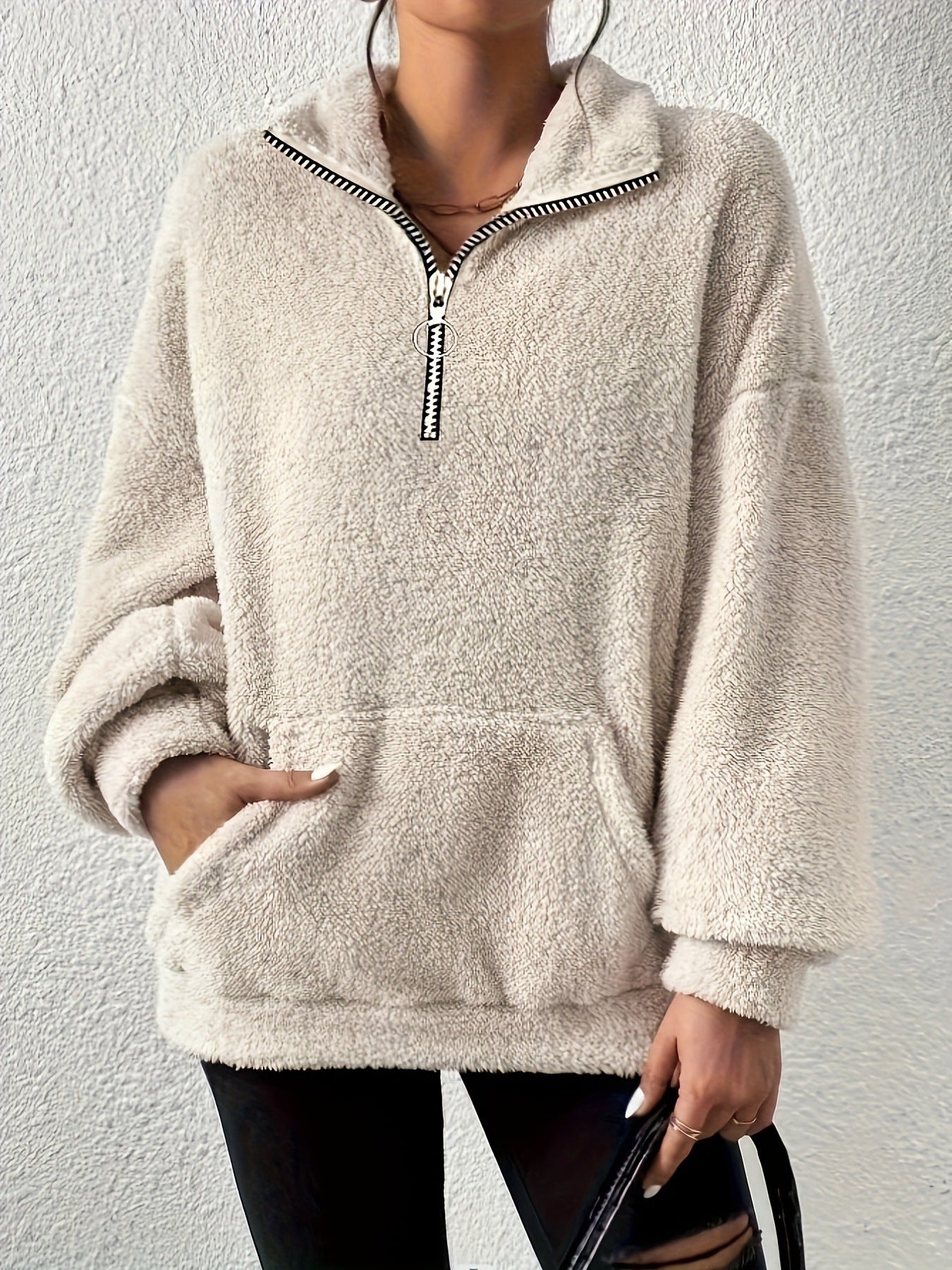 Pull en polaire douillet pour femmes avec demi-fermeture éclair et poches latérales Chic und Stil