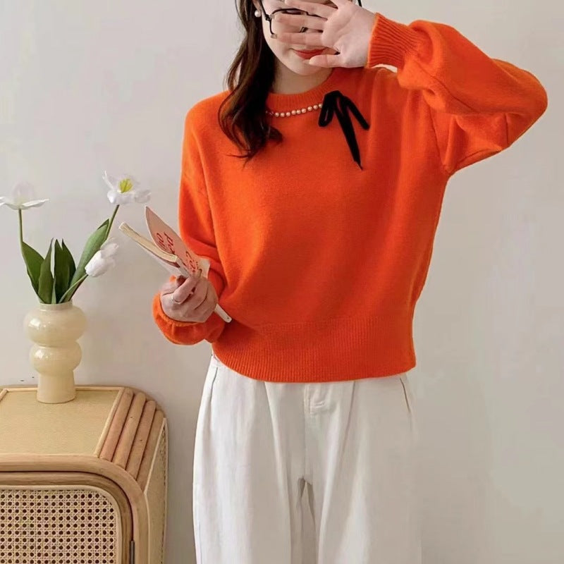 Dames pull mode avec bande décorative et détails en perles Chic und Stil